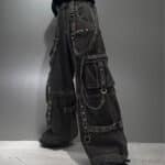 Front view of Black Denim Wash Strap On Zip Off Tripp Pants, highlighting the sleek design and zip-off feature.