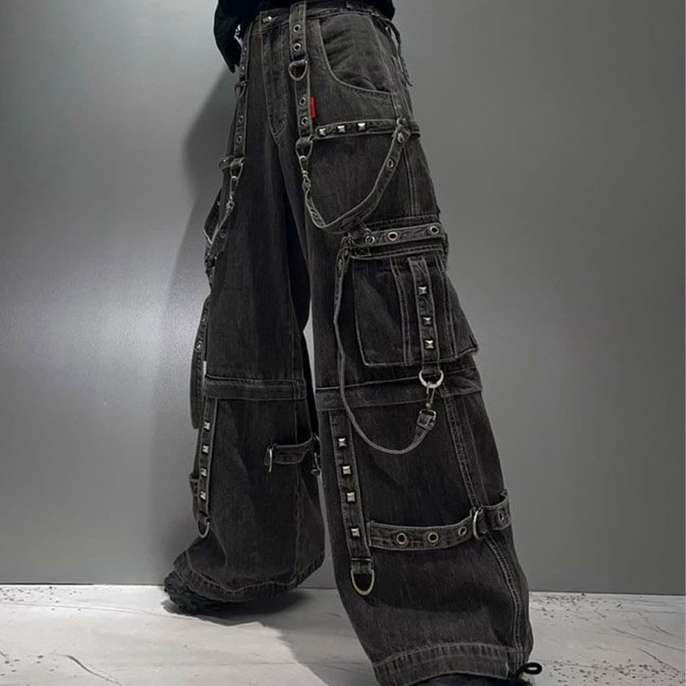 Front view of Black Denim Wash Strap On Zip Off Tripp Pants, highlighting the sleek design and zip-off feature.