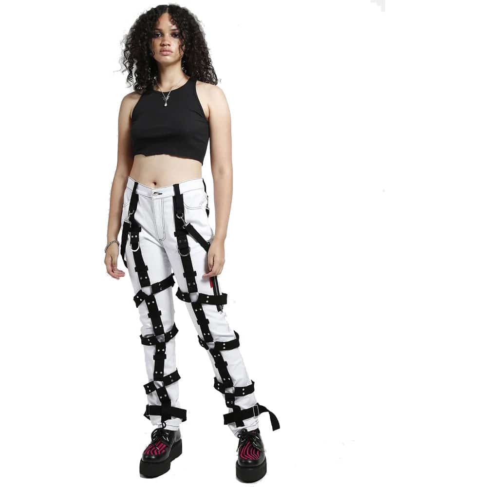 Front view of The Harness Bondage Pant showcasing its bold harness straps and metal hardware on white pants.