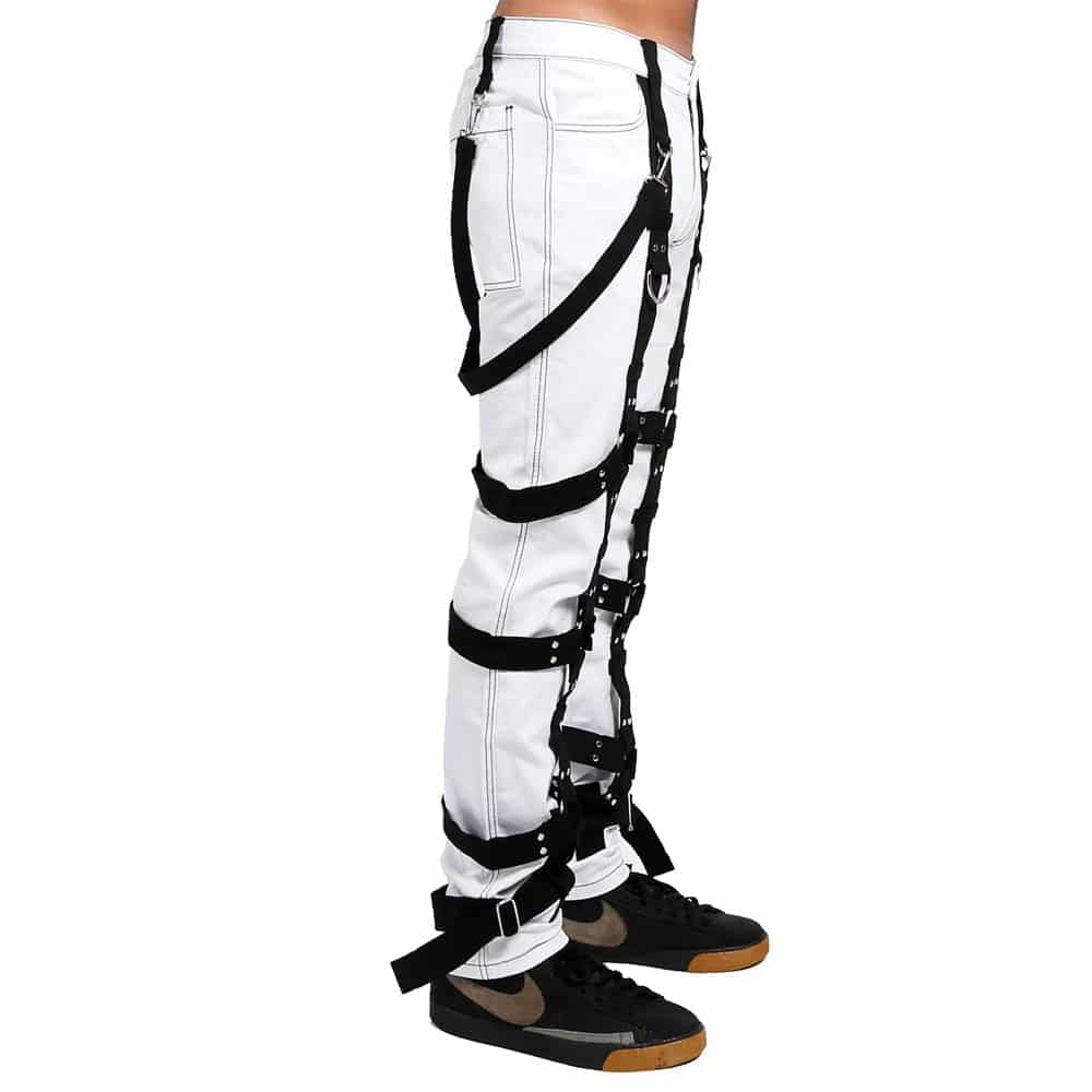 Side view of The Harness Bondage Pant highlighting the adjustable straps and sleek fit on the white pants.