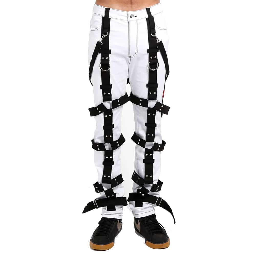 Front view of The White Harness Bondage Pant showcasing its sleek design, featuring multiple harness straps, silver metal accents, and a crisp white color that contrasts against the model's dark shirt.